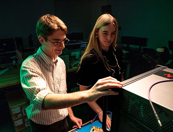 Two Embry-Riddle students work in the Radar and Microwaves Lab.
