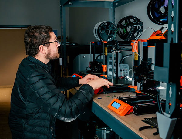 Student in the Rapid Prototyping Lab