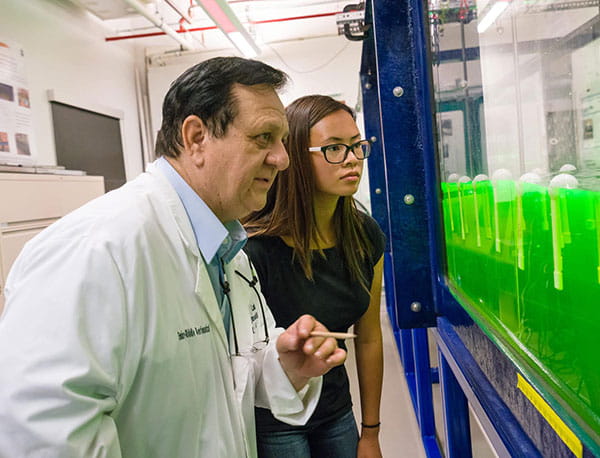 Student and faculty in the Wave Lab