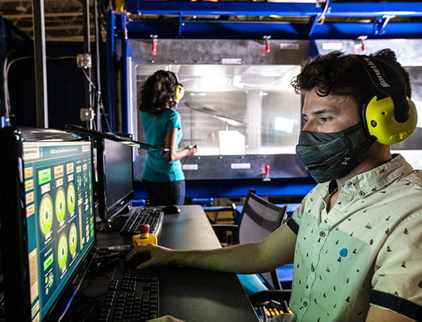 Aerospace Engineering students Rossana Fernandes and Matthew O'Brien in the Wind Tunnel Lab