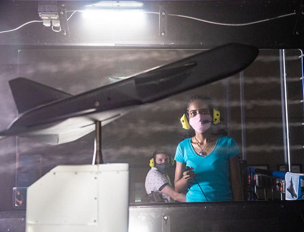 Aerospace Engineering student Rossana Fernandes in the Wind Tunnel Lab