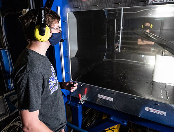 Aerospace Engineering student Spencer Moore in the Wind Tunnel Lab