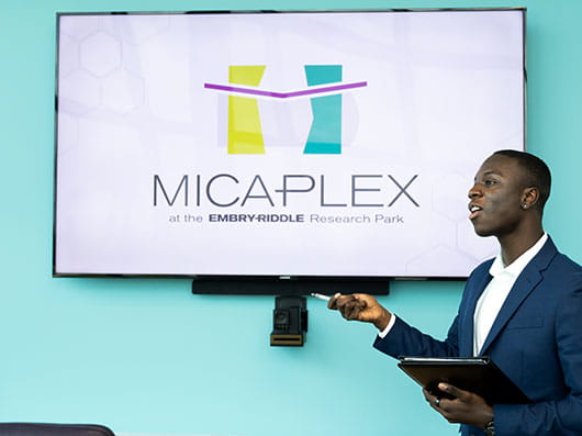 MicaPlex logo on TV screen