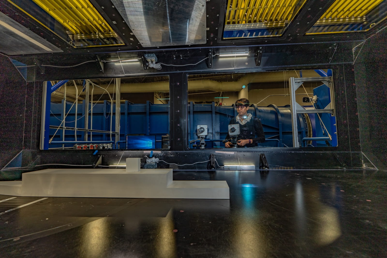 Student working in wind tunnel
