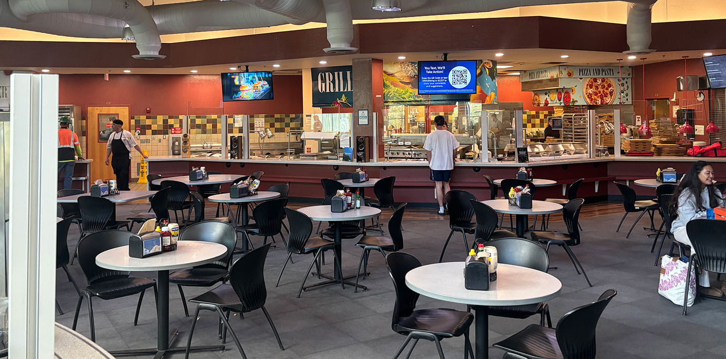 Embry-Riddle student stands in line for food in Earhart's Dining Hall on Prescott Campus