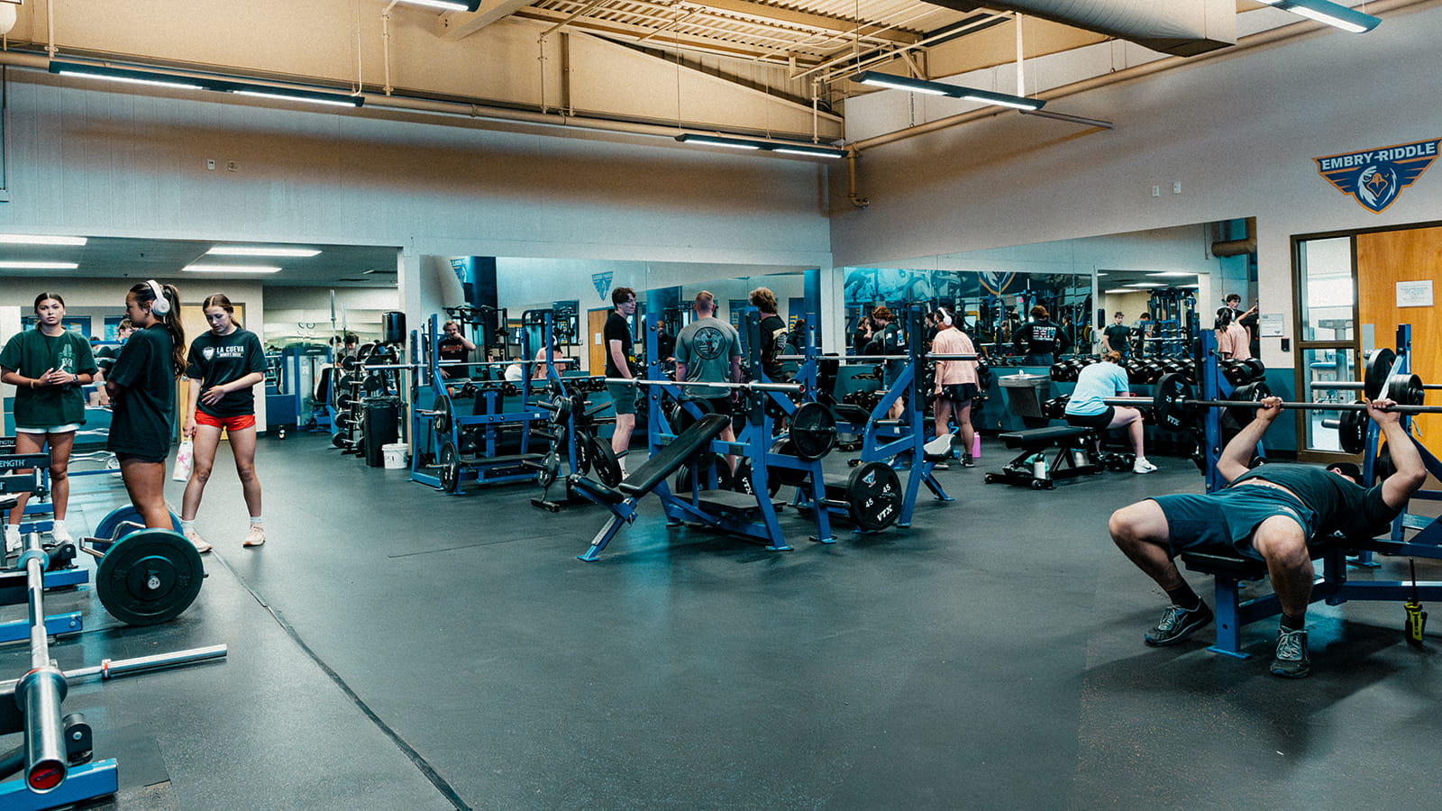 Embry-Riddle students exercise in the weight room