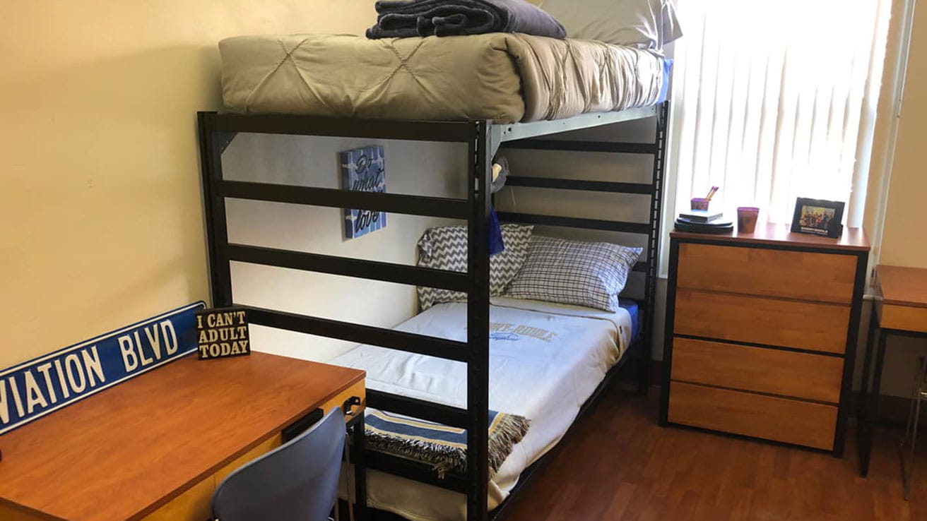 A room with bunk beds in Adams and Wood Hall
