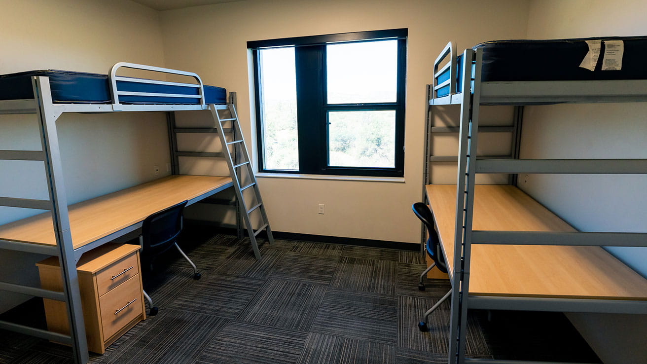 Thumb Butte Complex Apartments beds and desks