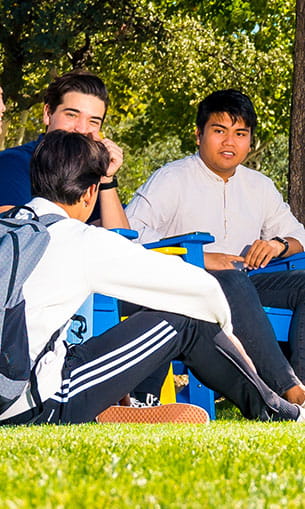 Students socializing on the Quad on Prescott Campus