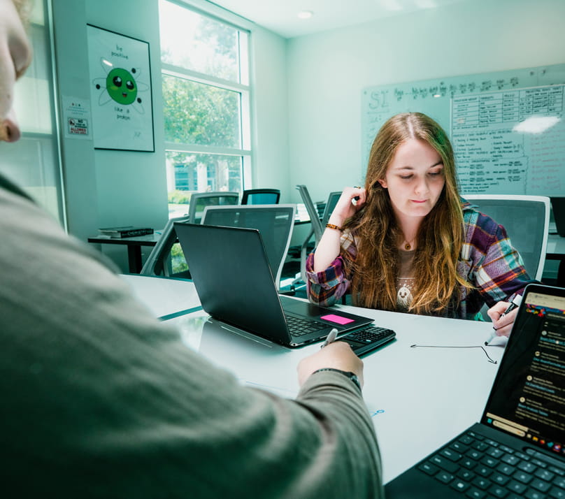 Embry-Riddle student sits with a tutor to get help on her homework.
