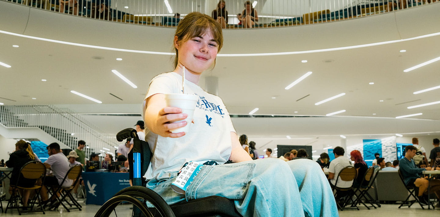 A young woman in a wheelchair