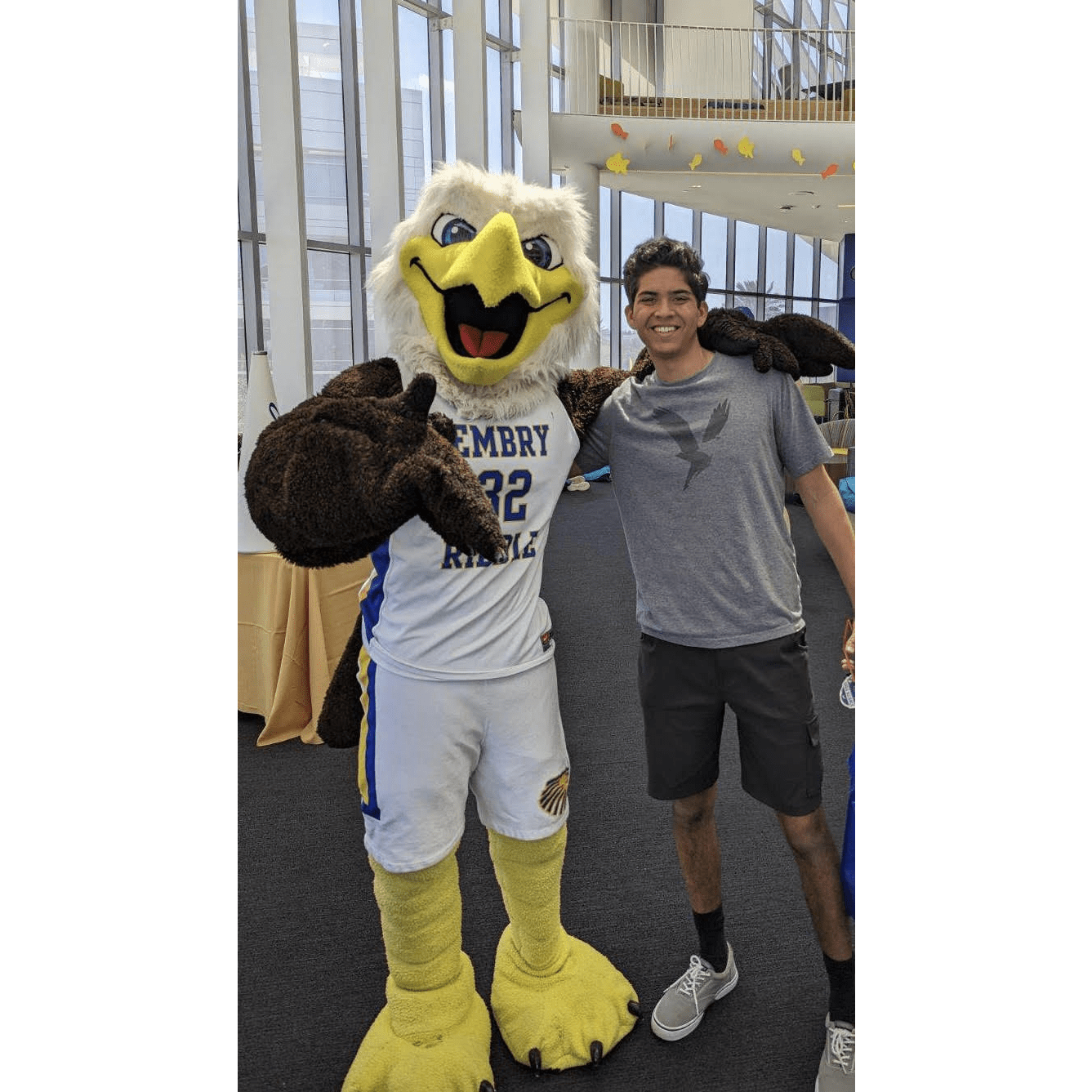 Aerospace Engineering major Adam Jain hangs out with his new friend Ernie the Eagle on the Daytona Beach Campus. (Photo: Adam Jain)