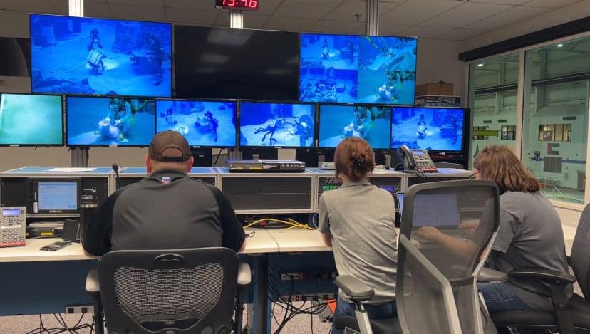 Catie Alfonzo-Jenner instructing NASA’s divers in the Neutral Buoyancy Laboratory. (Photo: Catie Alfonzo-Jenner)