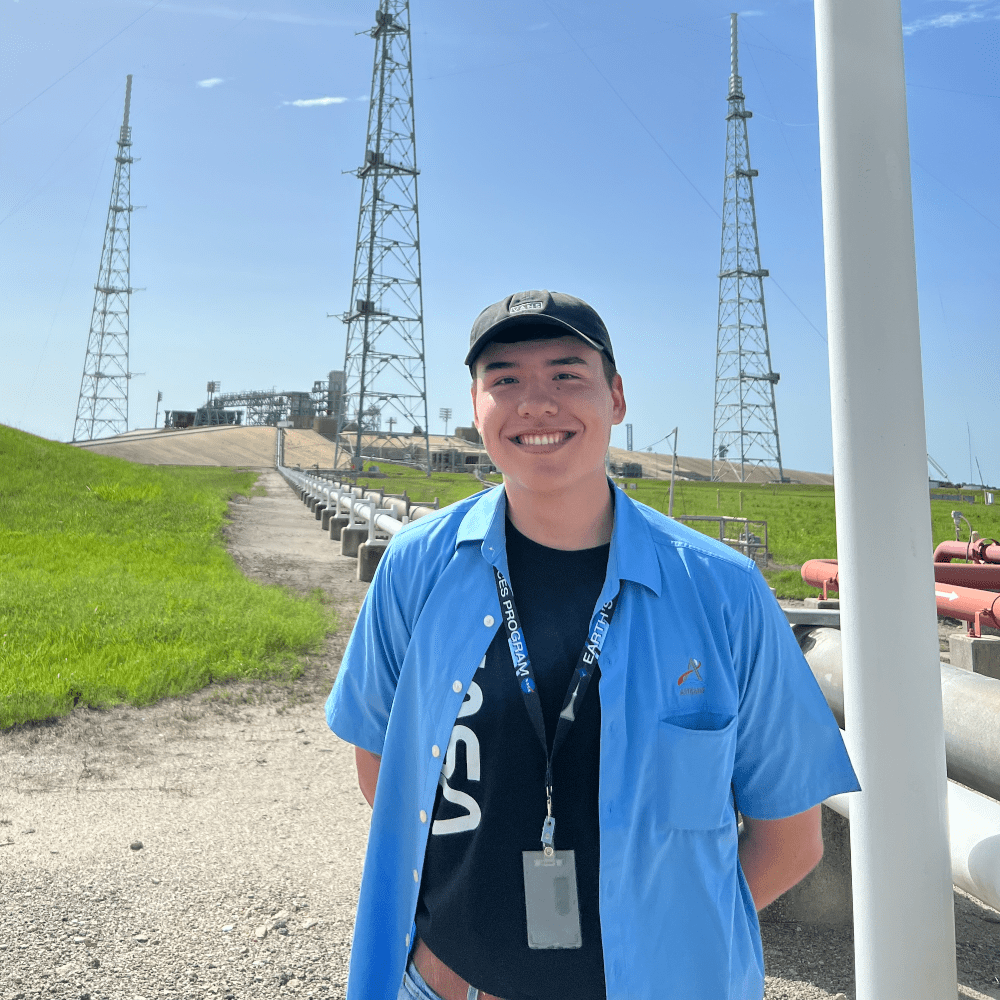 Aerospace Engineering major Connor Arnold standing outdoors at a NASA facility. (Photo: Connor Arnold)