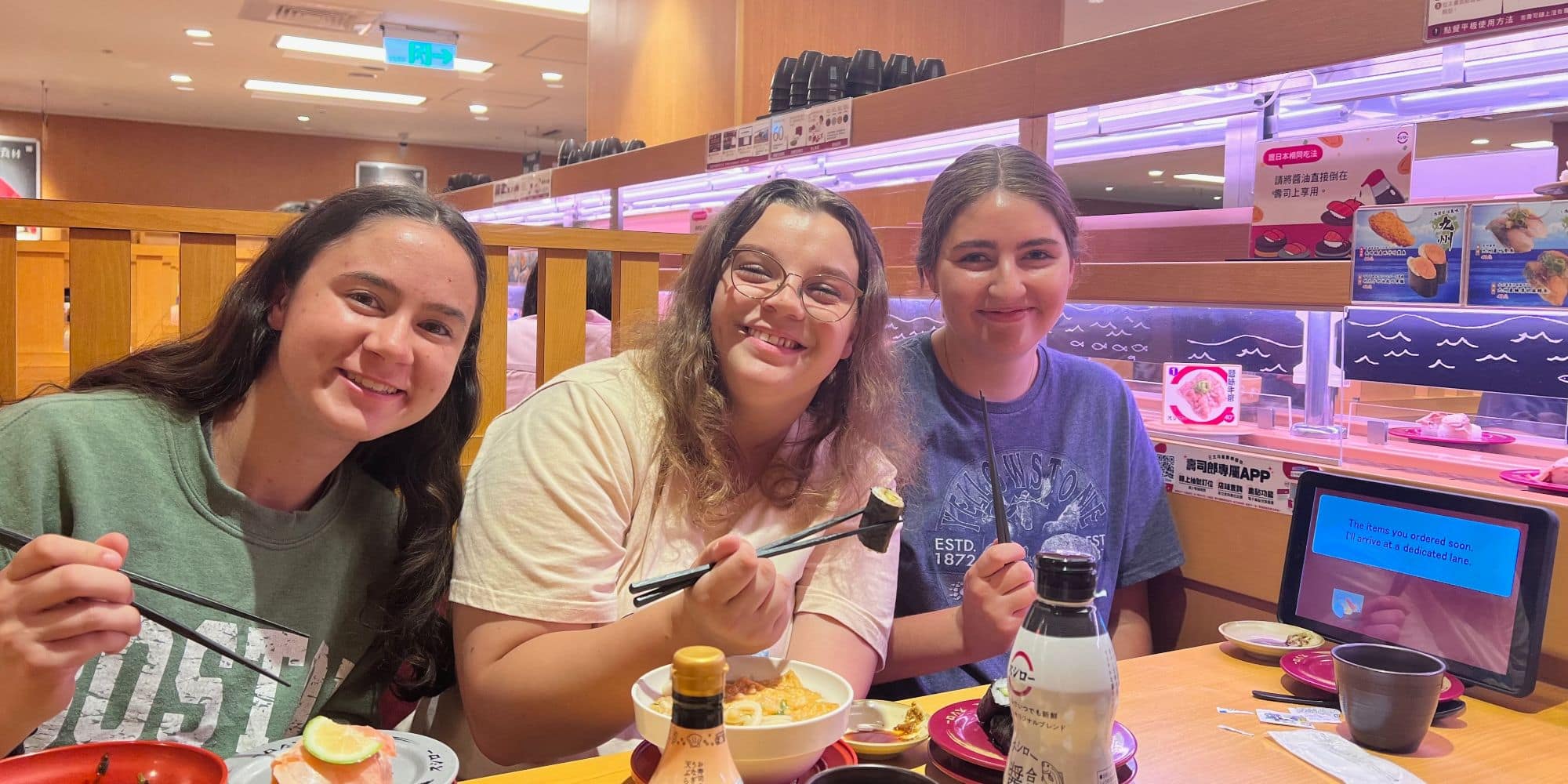 Me and two other classmates (ERAU Prescott students) at a rotating sushi restaurant. (Photo: Alix Craft)