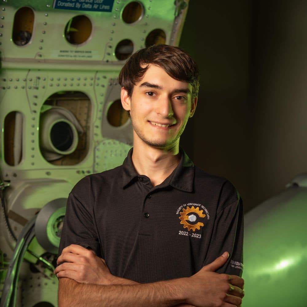 B.S. in Aviation Maintenance Science major Aiden Cunningham standing in a Boeing 757 credits Embry-Riddle's reputation and accomplished alumni as his main reason for pursuing his degree at Embry-Riddle.