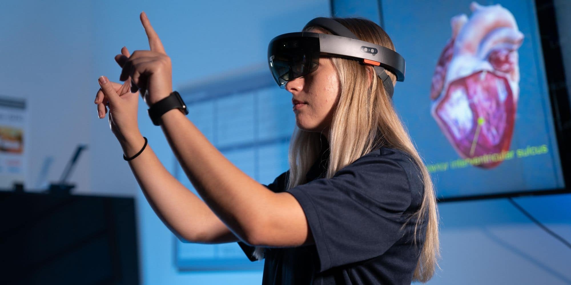 Jessyca Derby in the Research in User eXperience Lab, equipped with a HoLoLens. (Photo: Embry-Riddle Aeronautical University / David Massey)