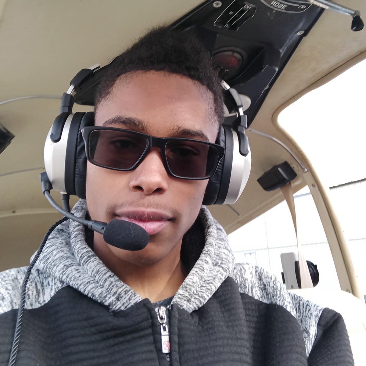 With headset in place, Josiah Moise is ready to add some more flight time to the growing total in his pilot logbook. 