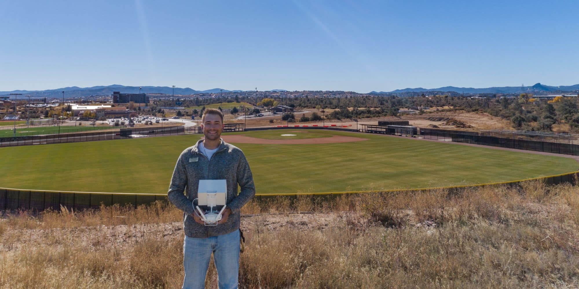 Unmanned Aircraft Systems student Taylor Mantick (’21) utilizes drone photography at the Prescott Campus baseball field.