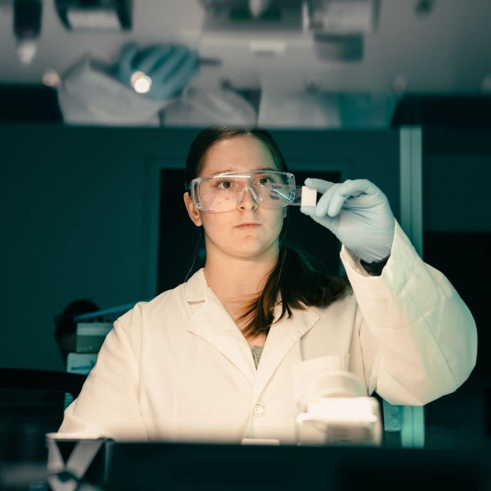 Aerospace Physiology student Danielle Norris examines a slide while working in Embry-Riddle’s Omics Lab. (Photo: Embry-Riddle / Bill Fredette-Huffman)