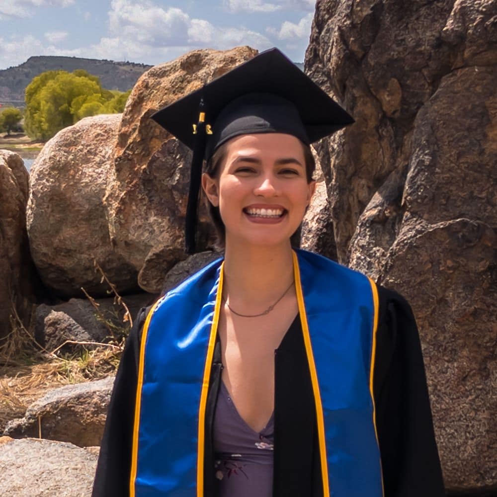 JaciLynn Poteet graduated with a B.S. in Aerospace Engineering in 2021 and poses for a picture standing beside the scenic boulders around Willow Lake in Prescott, Arizona. (Photo: JaciLynn Poteet)