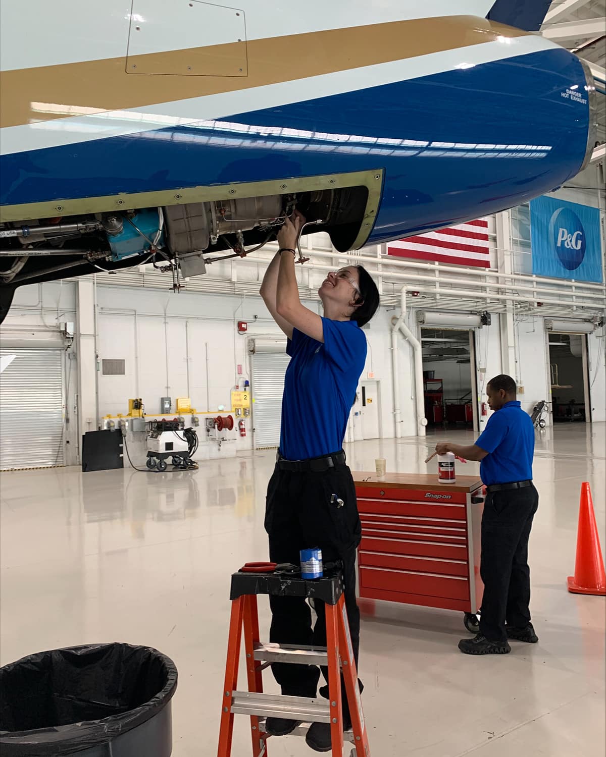 As part her summer internship at Proctor & Gamble, Shelby Quillinan is shown here working near the tail section of one of the company’s four business jets. (Photo: Shelby Quillinan)
