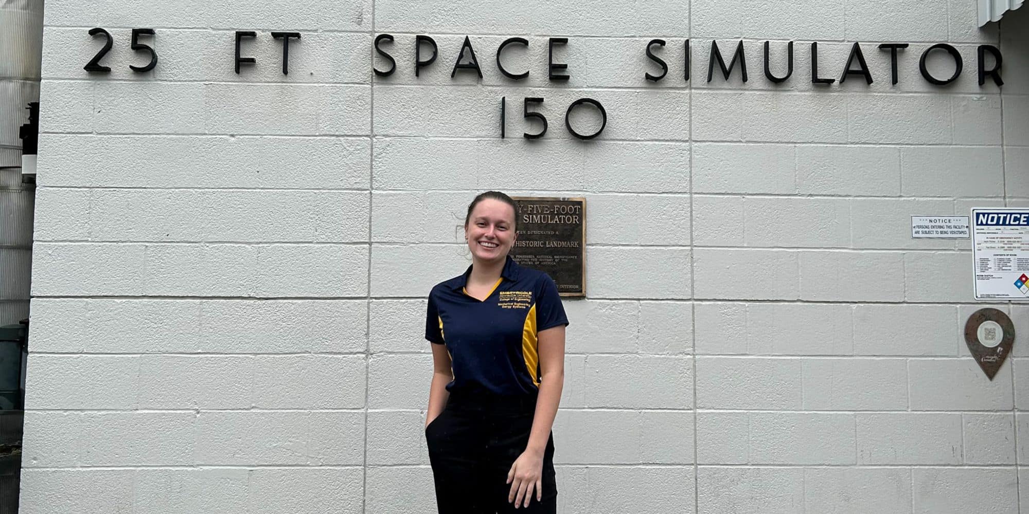 Leah Smith in front of the building that houses the NASA JPL 25ft Space Simulator. (Photo: Leah Smith)