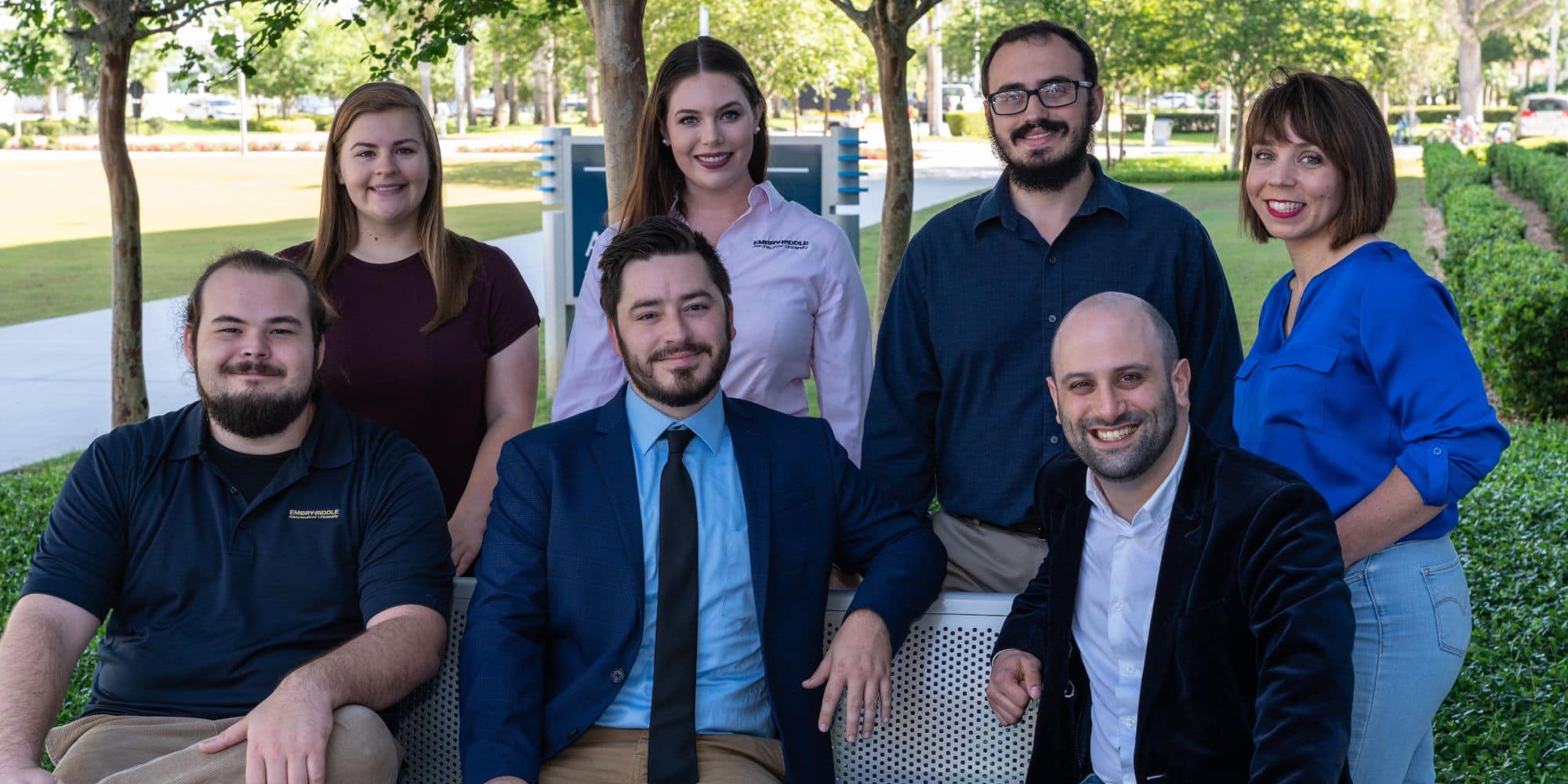 In this 2019 photo, Dr. Joseph Keebler (right) and his wife, Associate Professor Dr. Elizabeth Lazzara (standing behind him), relax with a team of students after presenting research that highlighted the importance of structured protocols to improve patient healthcare during a high-level conference. Pictured with the professors are students (front, left to right) Andrew Griggs and Logan Gisick and (back, left to right) Emily Rickel, Jordan Hilgers and Richard Simonson. (Embry-Riddle/Daryl LaBello).