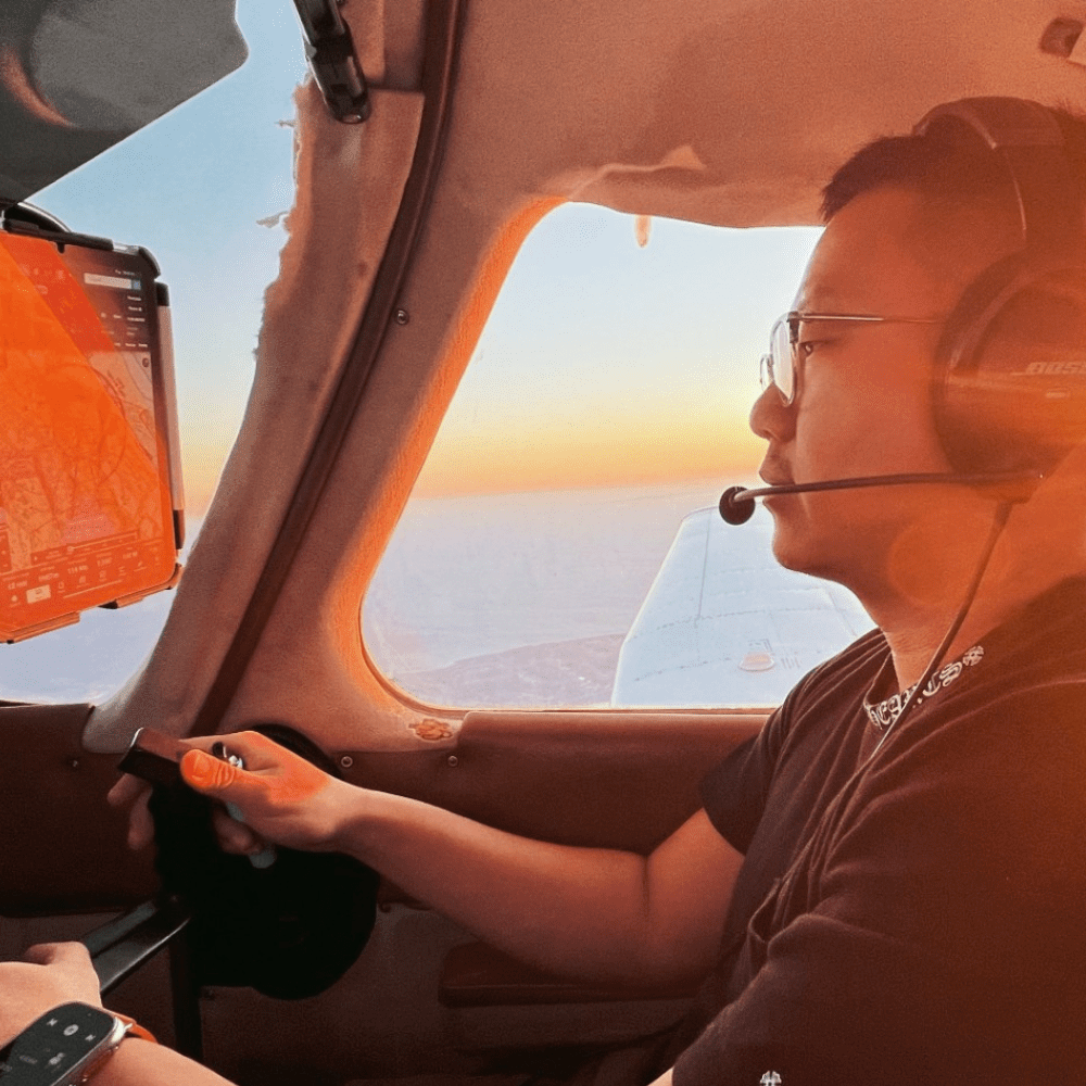 A person flying an airplane.