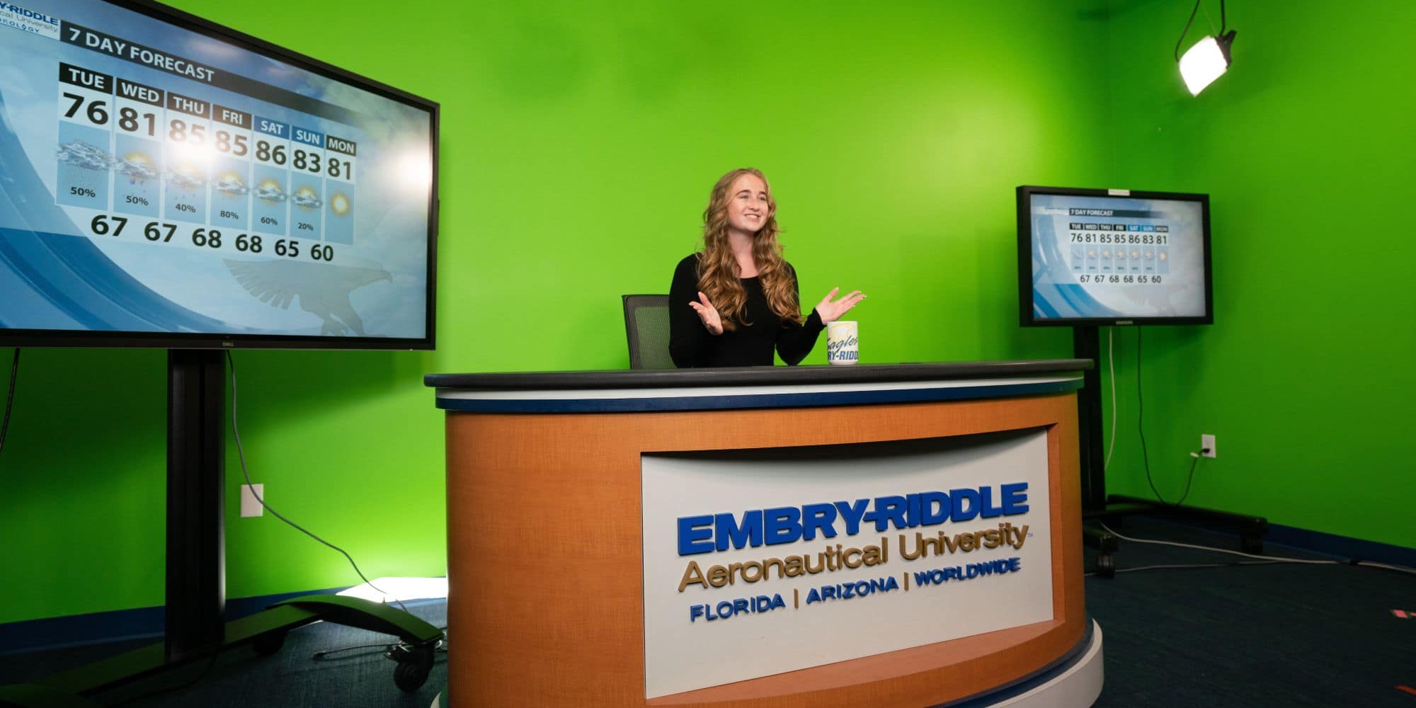 Danielle Van Pelt sharing today’s forecast on the Embry-Riddle campus. (Photo: Embry-Riddle / Joseph Harrison)