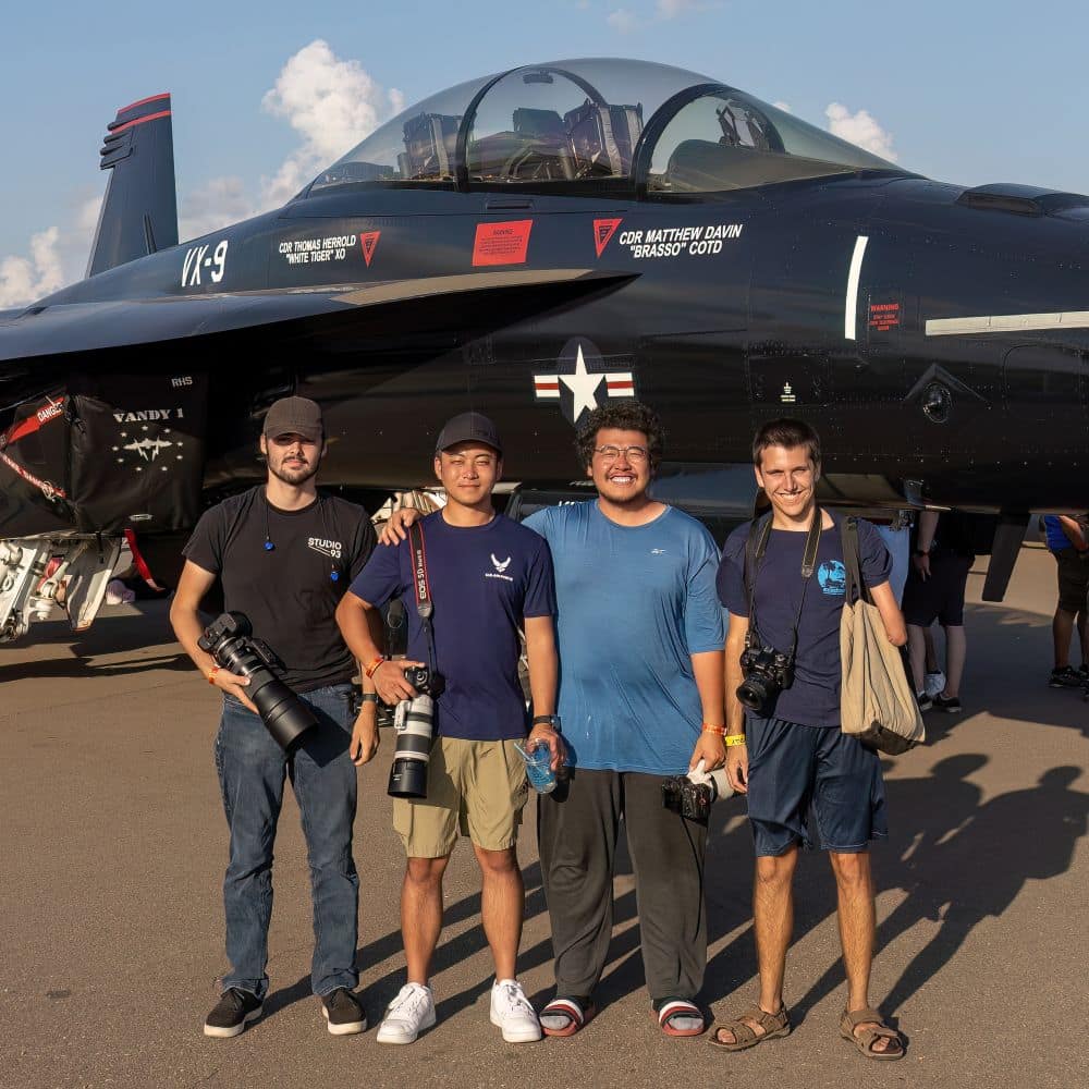 Bastien Melin, Hao Wu, Wen Wu and fellow photographer Chris (last name to come) pose in front of an F-18 during Sun ‘n Fun 2023.