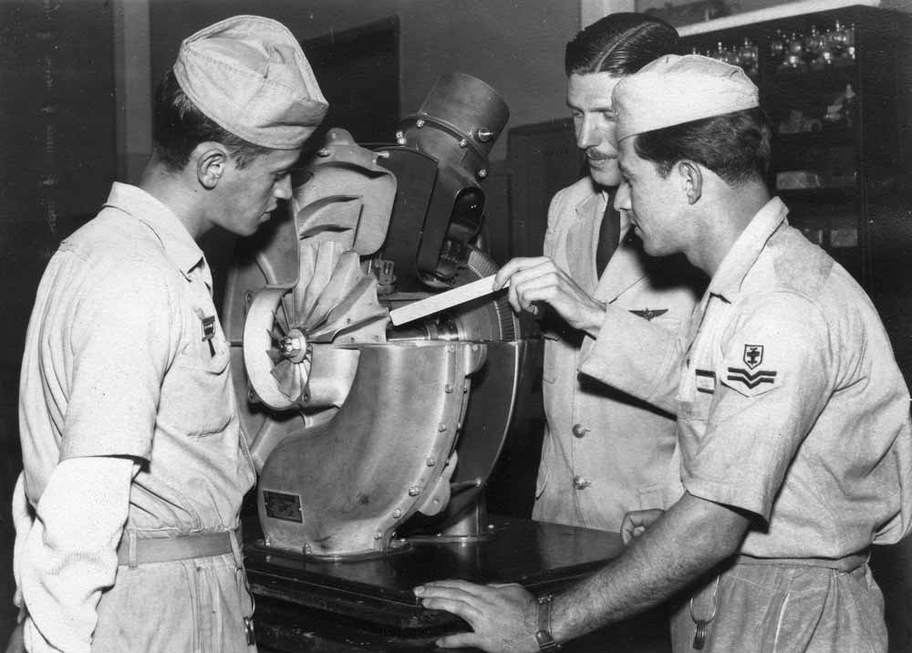 View of students working on turbo supercharger at Escola Técnica de Aviação, São Paulo, Brazil.