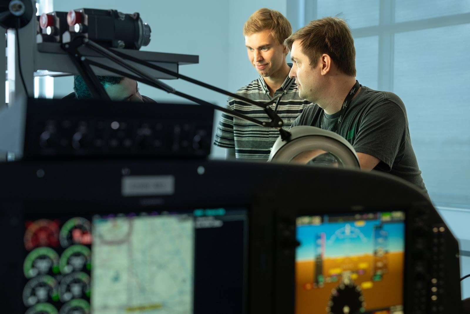  Embry-Riddle airworthiness engineer graduate students working in the NEAR Lab.