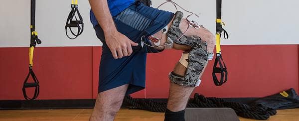 Man wearing a mechanical knee brace.