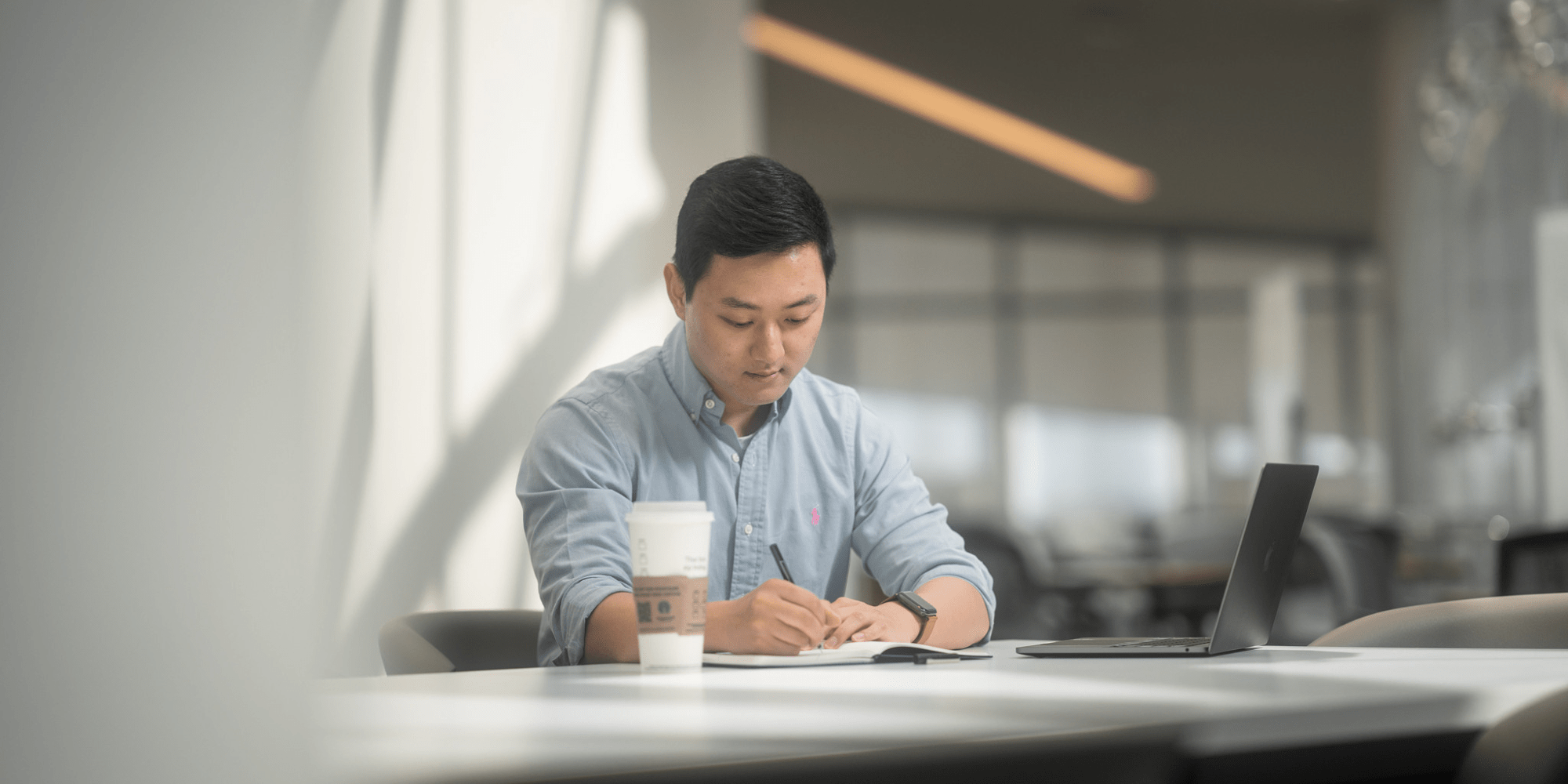 A student studying in Embry-Riddle's Hunt Library.