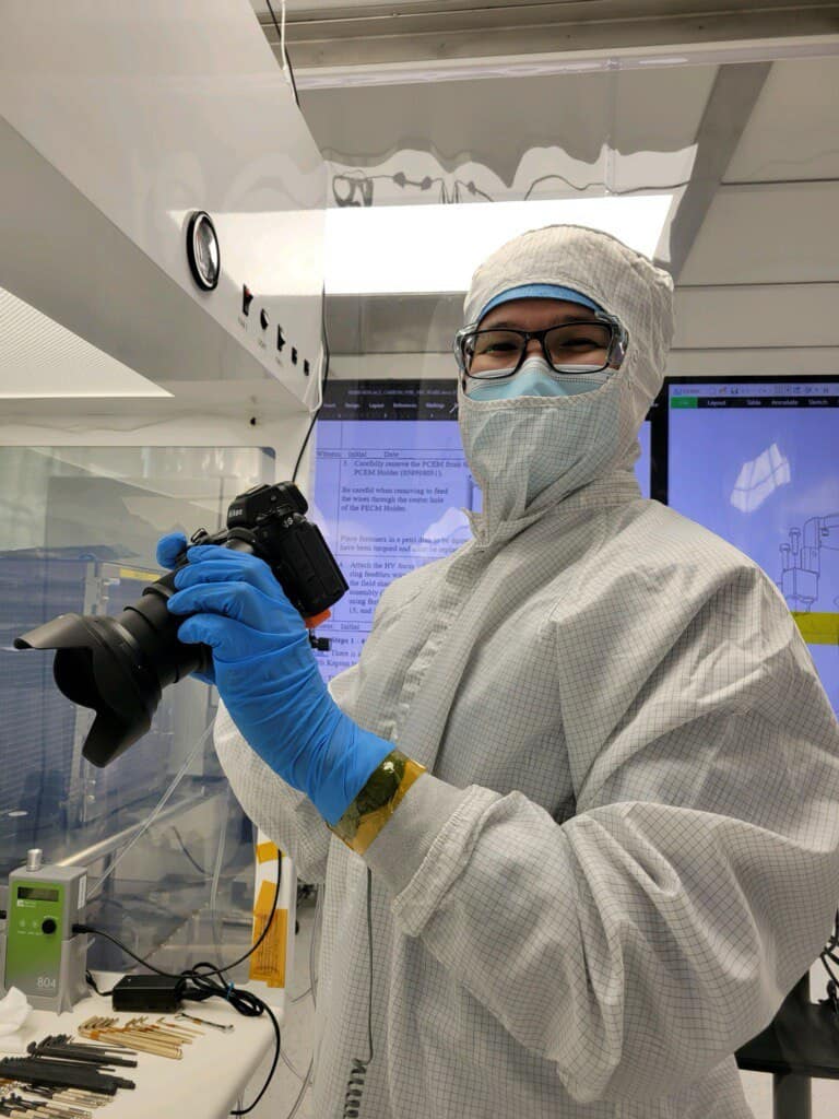 Mergen in lab gear.