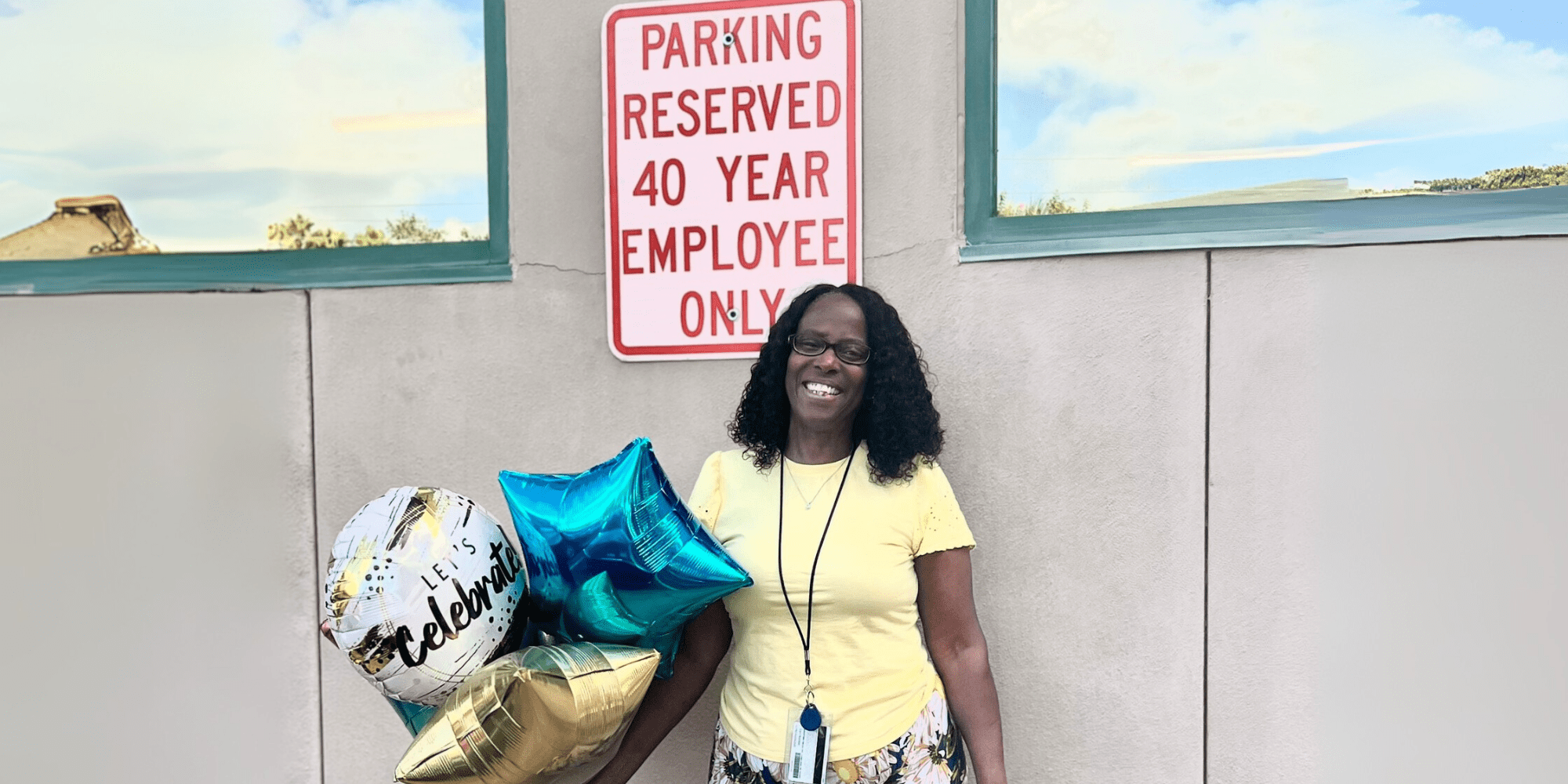 Lisa Spencer with her 40-year-employee parking spot.