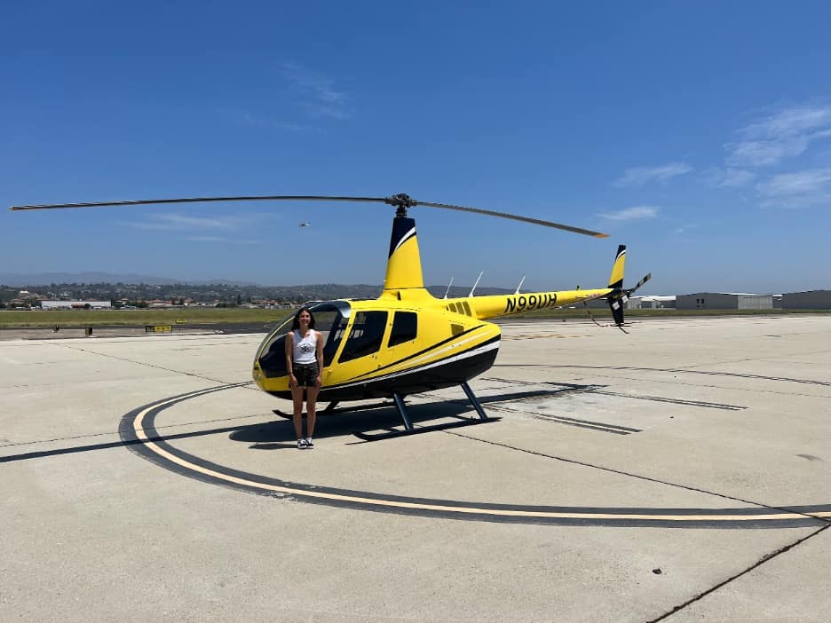 Nichole with her helicopter.