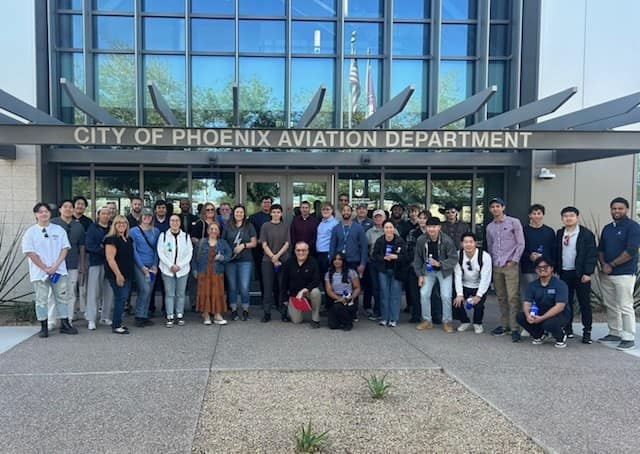 Students at the airport after taking the tour.