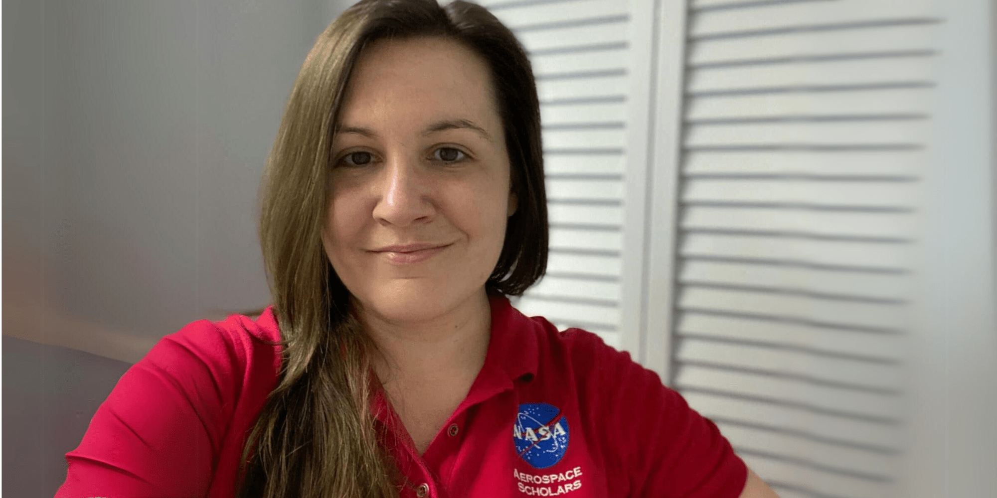 M.S. in Human Factors grad Nicole Schoenstein shows off her NASA Aerospace Scholars shirt. (Photo: Nicole Schoenstein)