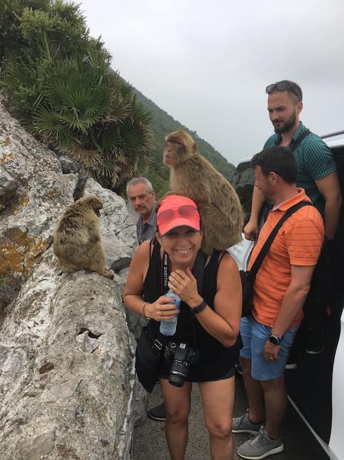 Jill in Gibralter with a monkey sitting on her back