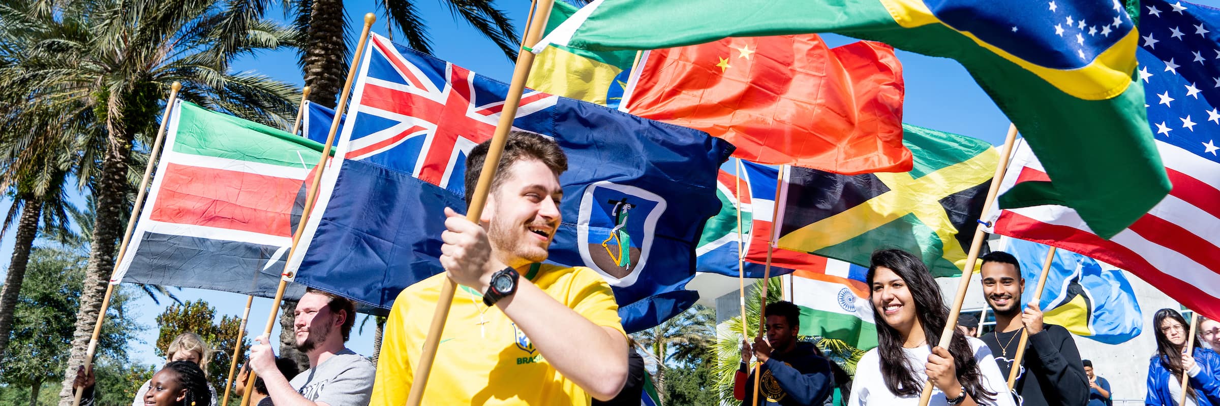 Embry-Riddle Aeronautical University students celebrated the start of International Education Week with a Flag Parade from the Henderson Welcome Center to the Mori Hosseini Student Union at the Daytona Beach Campus on Nov. 18, 2019. (Embry-Riddle/Paige Wilson)