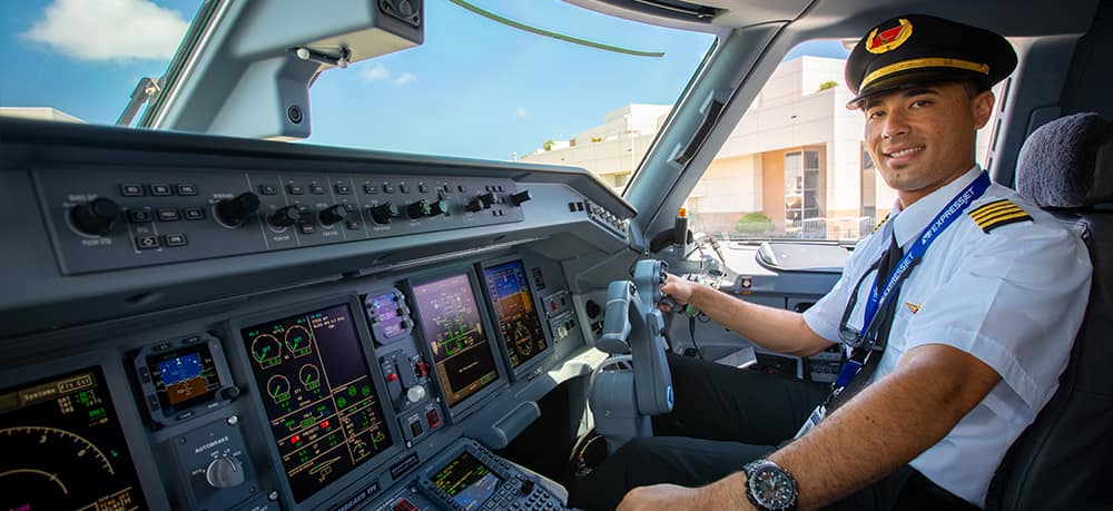 An Embry-Riddle pilot in the cockpit of an airplane