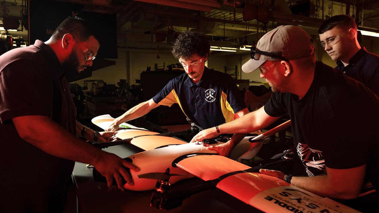 Embry-Riddle students working on a drone