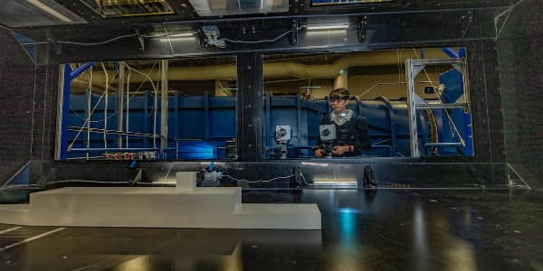 a student does research in the Wind Tunnel at the MicaPlex