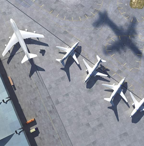Airplanes siting at an airport