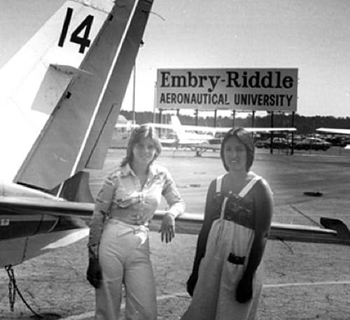 Women next to a plane