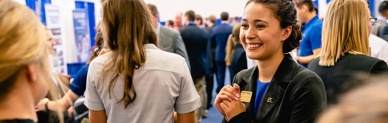 woman smiling at an Embry-Riddle career fair